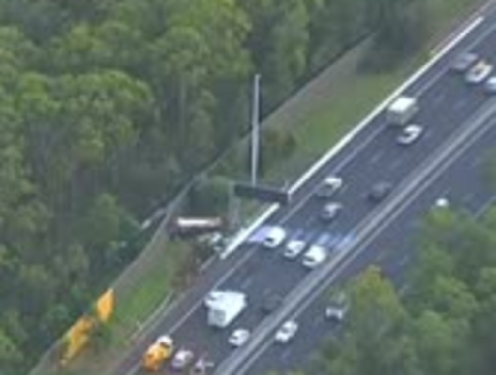 Sydney traffic come to standstill on the M5 after a milk truck crashed into an embankment on Wednesday morning. Picture: Channel 7