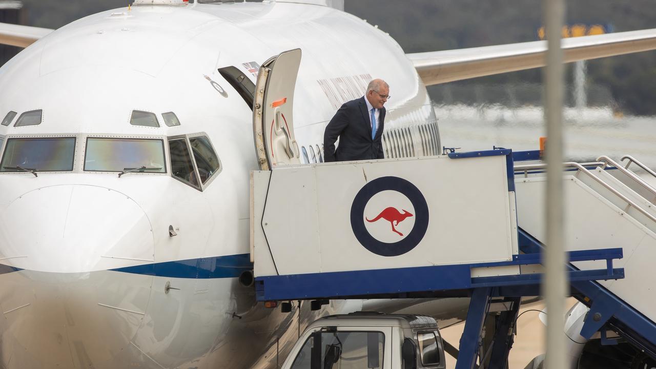 Prime Minister Scott Morrison arrives in Canberra airport aboard a defence plane ahead of the announcement of the federal election. Picture: Jason Edwards