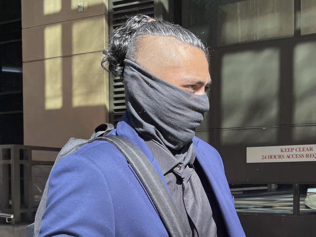 Jemli Williams Mariner left the Melbourne Magistrates’ Court with a bandana covering his face. Picture: Laura Placella