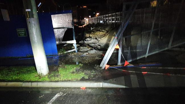 The damaged fence of the Frankston construction site where alleged thieves stole multiple excavators. Picture: Victoria Police.