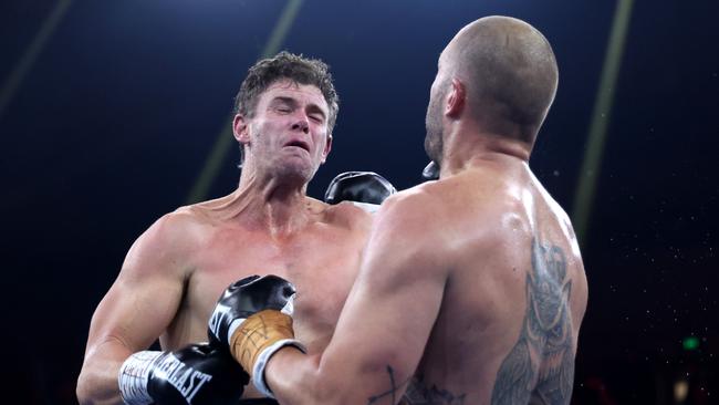 Some big punching between the AFL greats. Photo by Robert Cianflone/Getty Images