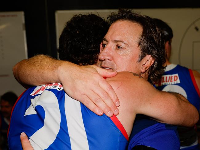 BALLARAT, AUSTRALIA - AUGUST 25: Luke Beveridge, Senior Coach of the Bulldogs hugs Tom Liberatore of the Bulldogs during the 2024 AFL Round 24 match between the Western Bulldogs and the GWS GIANTS at Mars Stadium on August 25, 2024 in Ballarat, Australia. (Photo by Dylan Burns/AFL Photos via Getty Images)