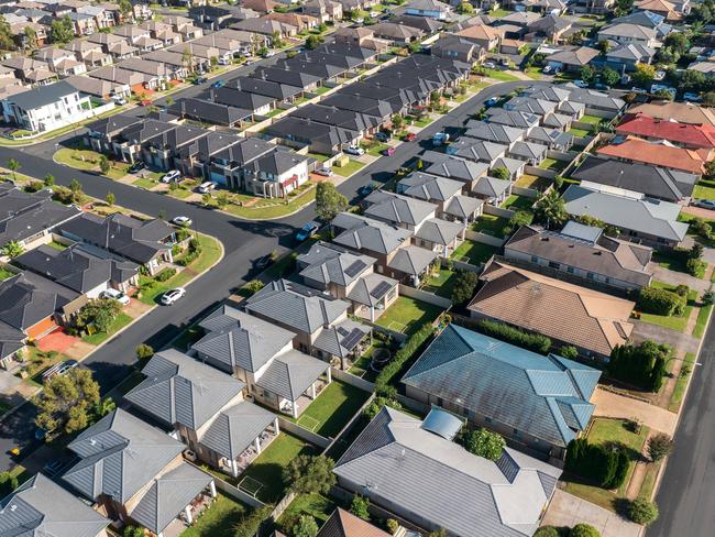 Aerial view of rows of mass produced 'cookie cutter' style homes build during the 2010s in outer suburban Sydney, Australia.