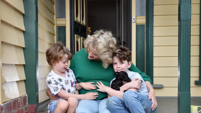 Clare O'Neil with sons Elvis, 7 and Louis, 4 and dog Clover. Picture: Nicki Connolly