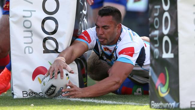 Ryan James scores one of his early tries for the Titans. Picture: Getty Images