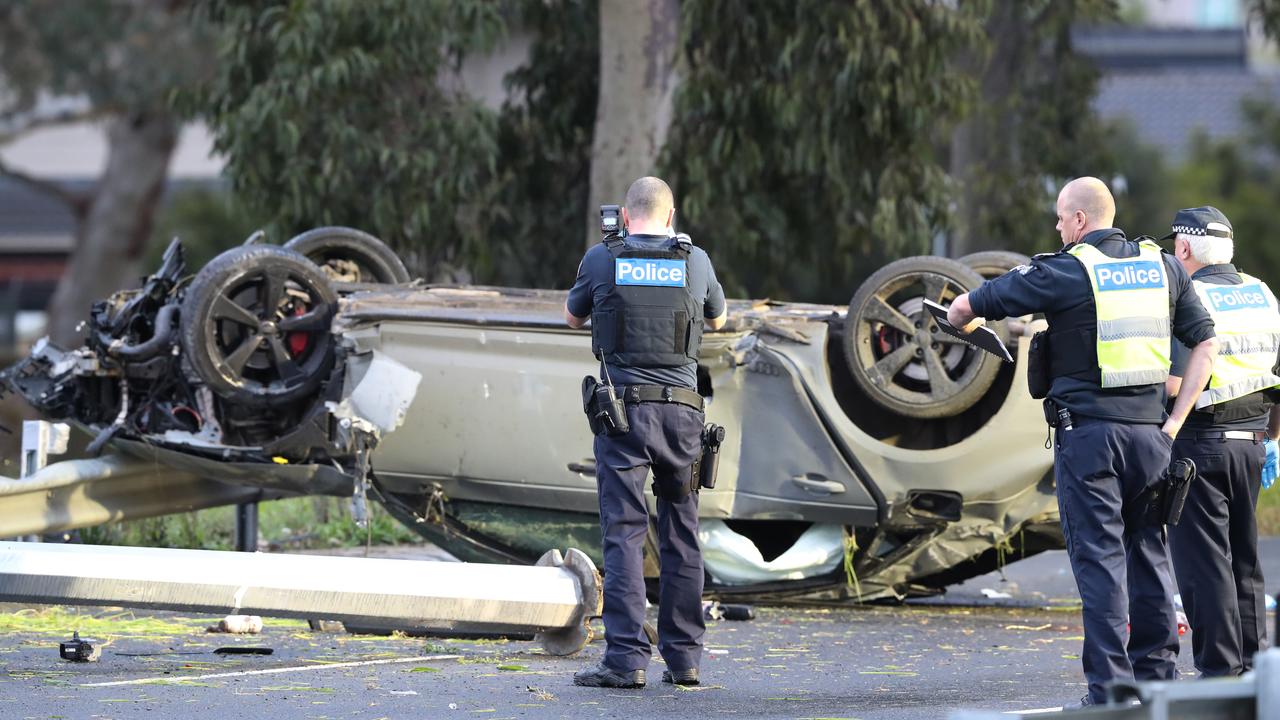 Police and emergency services at a fatal car crash on Plenty Rd in Bundoora. Picture: David Crosling