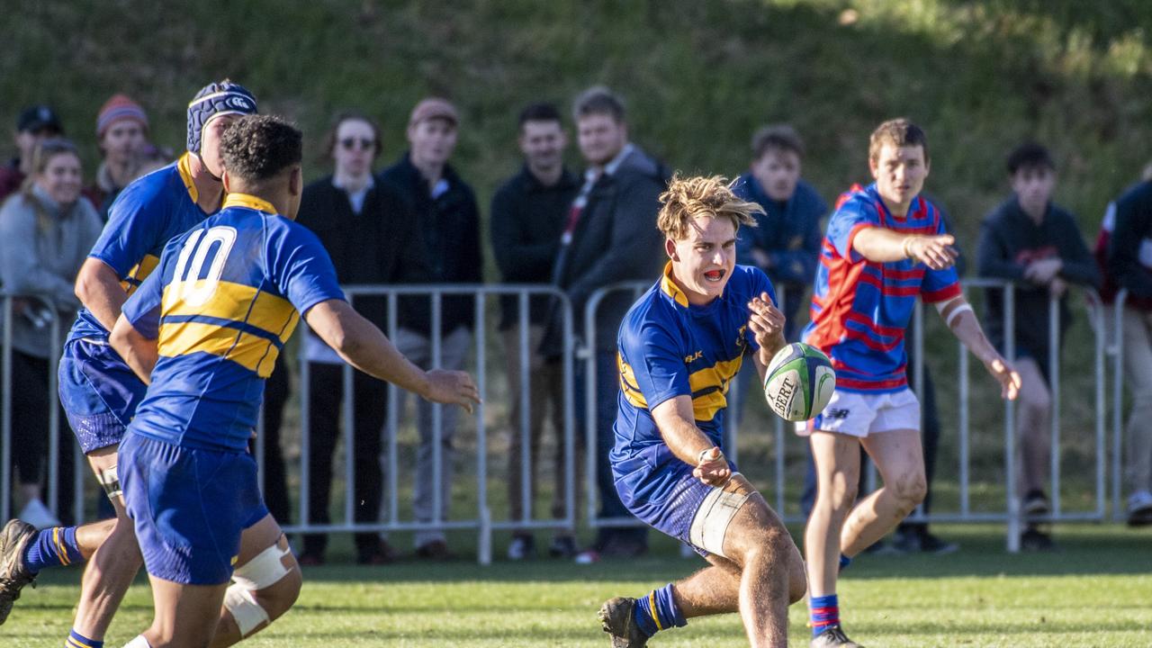 Clancy McPherson gets the ball away for Grammar during last year’s O’Callaghan Cup match.