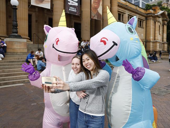 State Library staff dressed as unicorns are bringing the magic to students’ study sessions. Picture: Richard Dobson