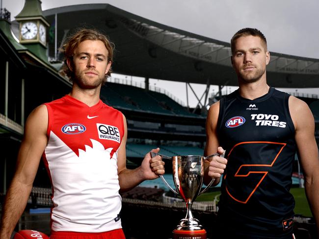 James Rowbottom of the Sydney Swans and Harry Himmelberg of the GWS Giants with the Sydney Derby Cup at the SCG on May 1, 2025 ahead of the Sydney Derby XXX. Photo by Phil Hillyard (Image Supplied for Editorial Use only - NO ON SALES - copyright Phil Hillyard )