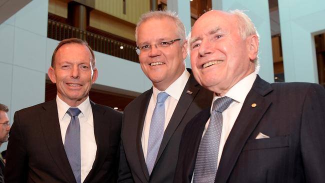 Despite losing his seat Tony Abbott was back in the capital for the opening of parliament this week. Pictured with Prime Minister Scott Morrison and John Howard. Photo by Tracey Nearmy/Getty Images