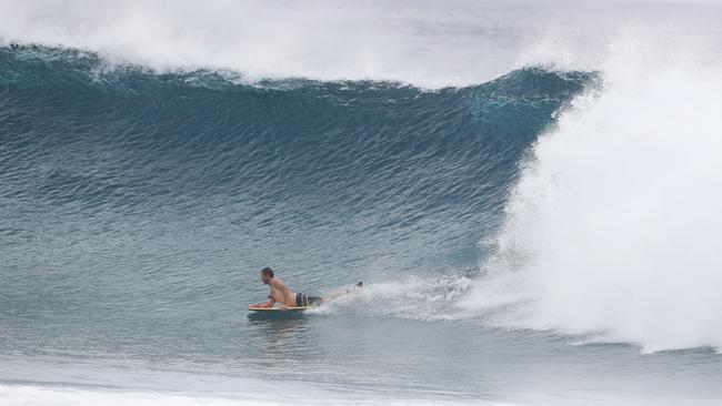 Surfers at Snapper Rocks and Kirra riding the Large swell produced by Cyclone OMA. Photograph : Jason O'Brien