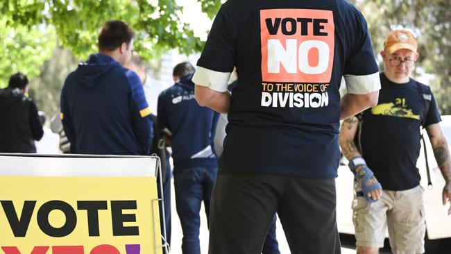 ‘Vote No’ volunteers at a polling centre in Canberra this month. Picture: Martin Ollman/Getty Images