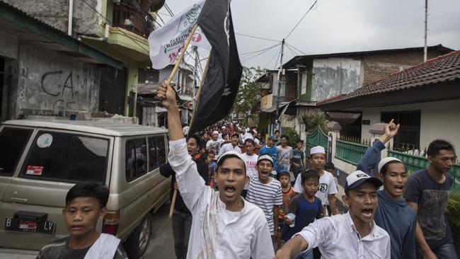 An Islamic flag at a post-election rally in Jakarta. Picture: Getty Images