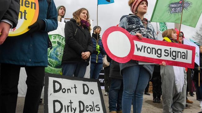 Activists in Munich protest Siemens’ involvement in the Adani coal project. Picture: AFP