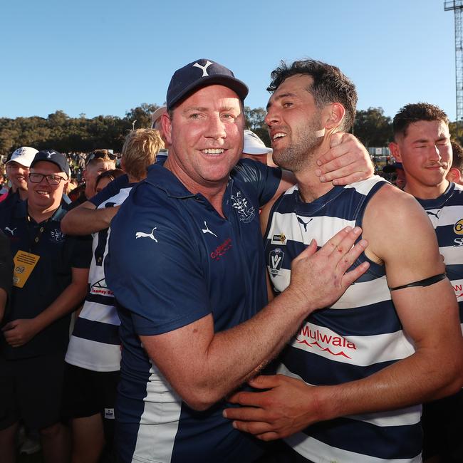 Yarrawonga coach Steve Johnson and star player Leigh Masters after the grand final win last year. Picture Yuri Kouzmin