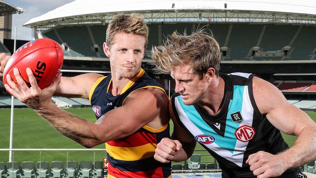 ADELAIDE, AUSTRALIA - MARCH 09: Rory Sloane of the Crows and Tom Jonas of the Power pose during the 2022 AFL Captains Day at Adelaide Oval on March 9, 2021 in Adelaide, Australia. (Photo by Sarah Reed/AFL Photos via Getty Images)