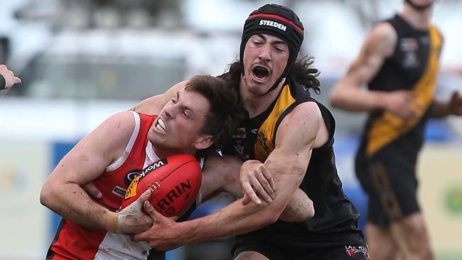 Gregor Knight, left, in Quambatook’s final home match this year against Macorna. Picture: Yuri Kouzmin