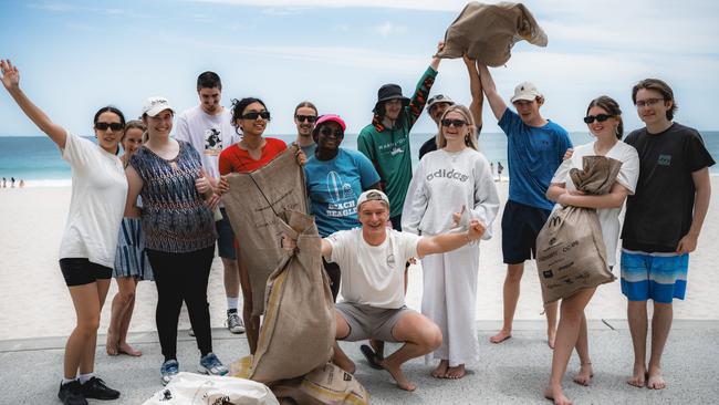 Co-Exist has organised beach clean-ups and tree planting events across Australia for young people to make a difference and socialise. Photo: Co-Exist