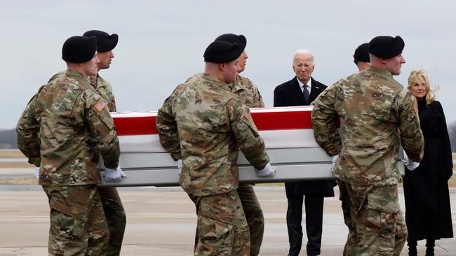 President Biden looks on as a US Army team carries the flag-draped casket of Sgt. Kennedy Sanders, one of three service members killed in a drone attack in Jordan. Picture: Getty Images/AFP