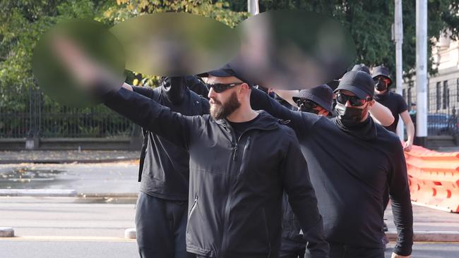 Anti immigration protesters in Spring St, Melbourne, in May. Far right activist Thomas Sewell is seen giving a Nazi salute. Picture: NCA NewsWire / David Crosling