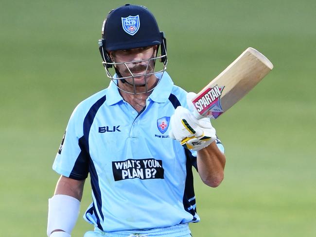 ADELAIDE, AUSTRALIA - MARCH 04: David Warner of the Blues celebrates making his half century during the Marsh One Day Cup match between South Australia and New South Wales at Adelaide Oval on March 04, 2021 in Adelaide, Australia. (Photo by Mark Brake/Getty Images)