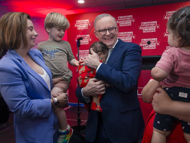 BRISBANE, AUSTRALIA - NewsWire Photos - DECEMBER 11, 2024:The Prime Minister Anthony Albanese holds baby Maise 3 months after delivering  a speech at the Morningside Panthers AFL club in Brisbane.Picture: NewsWire / Glenn Campbell