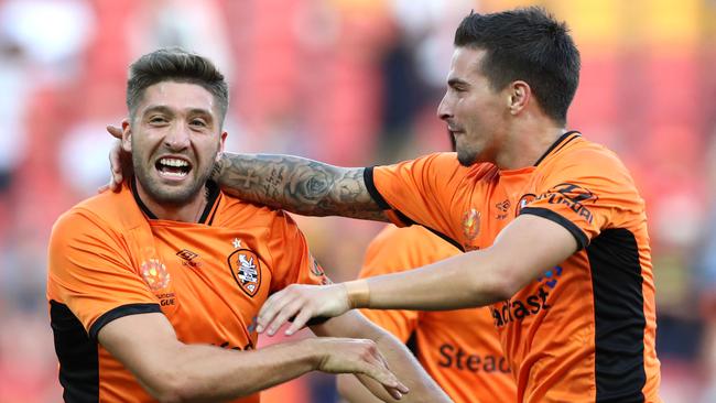 Brisbane Roar forward Brandon Borrello (left) celebrates scoring against Perth Glory with teammate Jamie Maclaren.