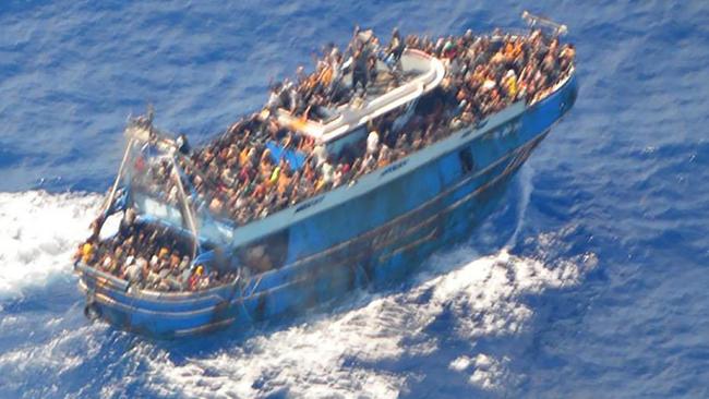 Migrants on-board a fishing vessel in the waters off the Peloponnese coast of Greece on June 13. At least 81 died after the boat sank. Picture: Hellenic Coastguard / AFP