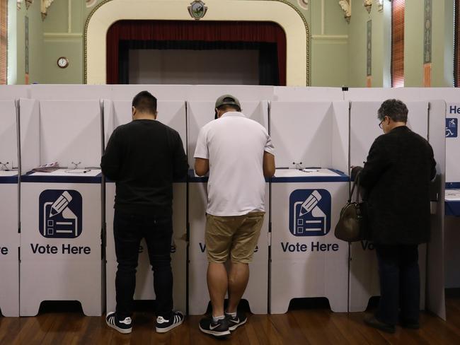 People line up to vote during pre-polling in Parramatta.