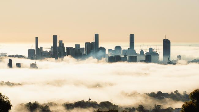 Fog over Brisbane seen from Mt Coot-Tha on Sunday. Picture: Richard Walker