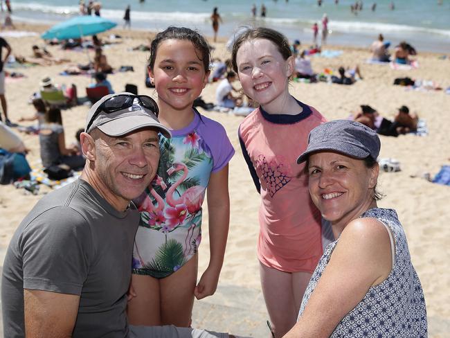 Kevin and Tania Cross, with Indiana, 11, and Riley Harrington-Hopkins, 11 at the Manly Jazz festival in 2016. Picture: Martin Lange