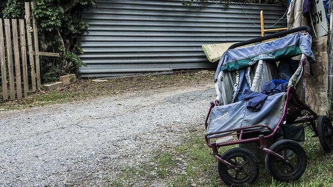 An old pram among the ramshackle buildings at the caravan park. Photographer: Gary Howard.