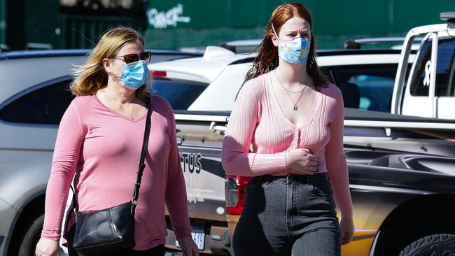 Two women wearing masks as the Manly Harris Farm store. Picture: NCA NewsWire/Gaye Gerard