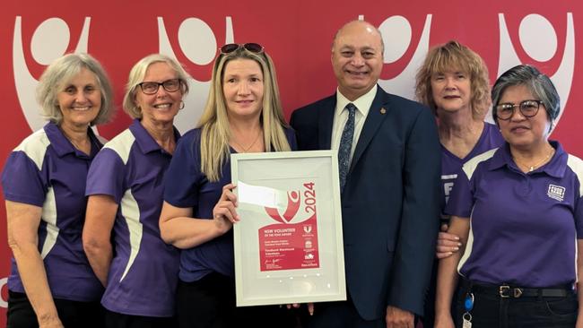 Mount Druitt MP Edmund Atalla with the Outer Western Sydney Volunteer Team of the Year, Foodbank warehouse volunteers. Picture: Supplied