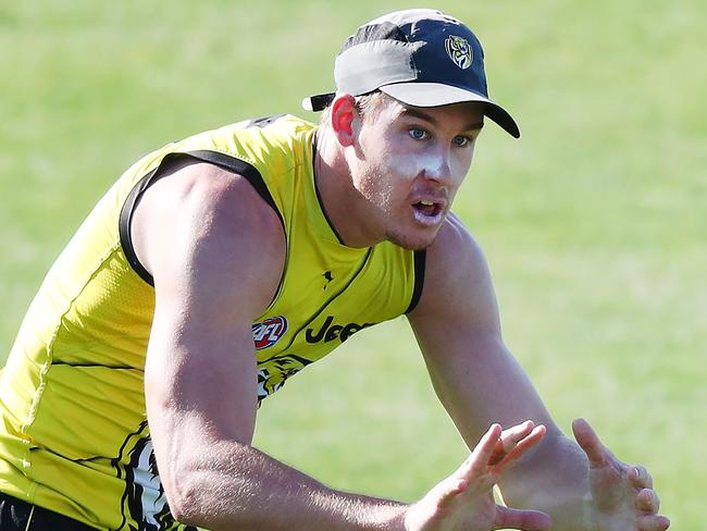 MELBOURNE, AUSTRALIA - FEBRUARY 02: Tom Lynch runs with the ball during a Richmond Tigers AFL training session  at Punt Road Oval on February 02, 2019 in Melbourne, Australia. (Photo by Michael Dodge/Getty Images)