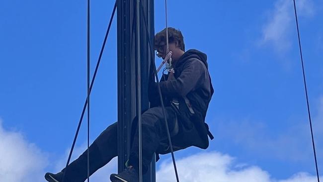 Charlie Goodfellow checking the mast in Hobart. Picture supplied: Deborah Wallace