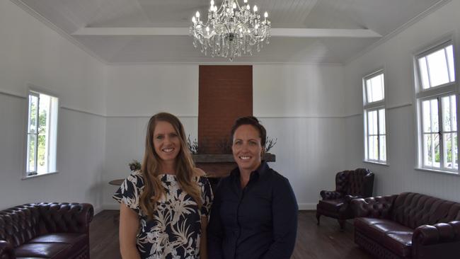 Sisters Andrea Farrow and Peta McNamara inside Huxham Hall.