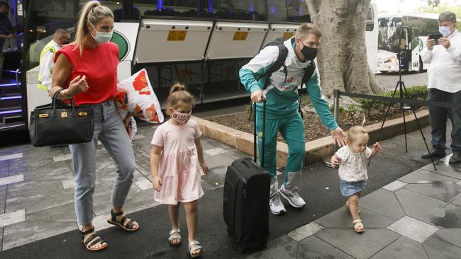 David Warner, with wife Candice and their daughters, arrives at the Australian team’s hotel in Sydney on Monday. Picture: Tim Pascoe