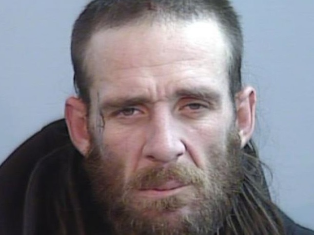 Kevin Smith, aged 37, is wanted by virtue of an outstanding arrest warrant for murder.