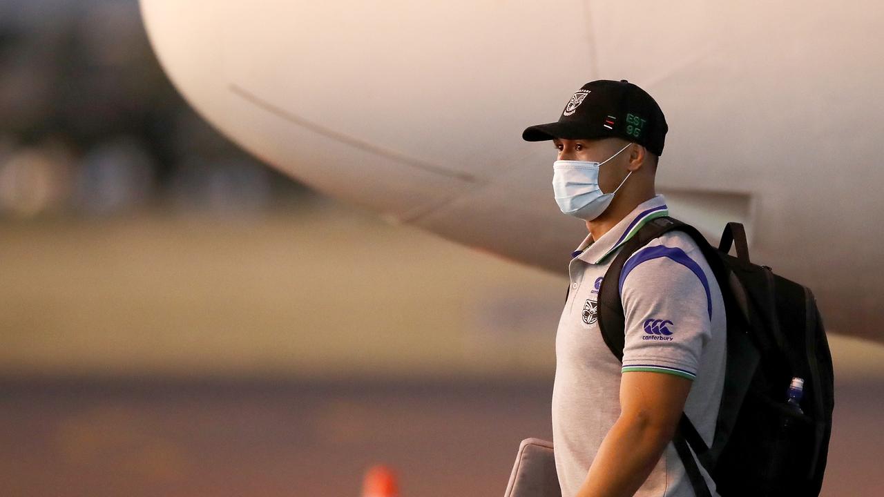 Roger Tuivasa-Sheck is seen wearing a mask as the Warriors land in Australia