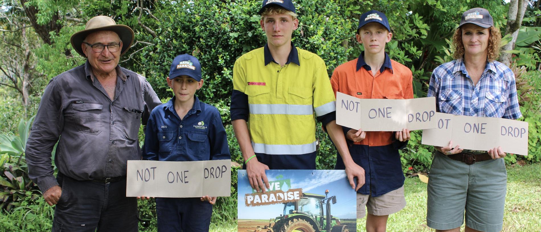 Several generations of Bundaberg farmers are calling on commitments to the future of water security in the region. From left: Joe Russo, Enzo Russo, Mark Plath, Jayden Van Rooyen and Judy Plath.