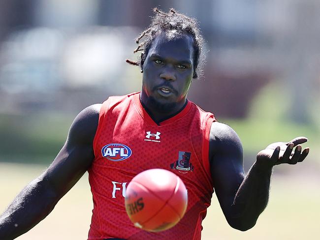 MELBOURNE.  23/02/2022.  AFL practise match .Essendon vs Western Bulldogs at the Hangar, Tullamarine.   Anthony McDonald-Tipungwuti of the Bombers has a hit out pre game     . Photo by Michael Klein