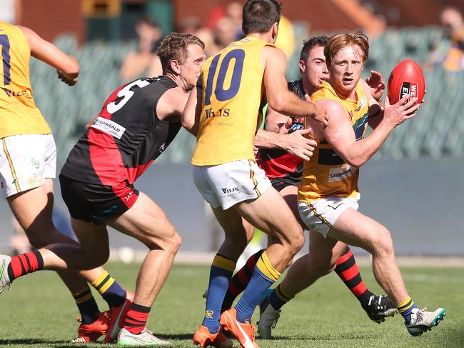 Angus Poole (Eagles) with the ball during the second quarter. West Adelaide v Eagles, at Adelaide Oval. SANFL ANZAC Day Football. 25/04/16 Picture: Stephen Laffer