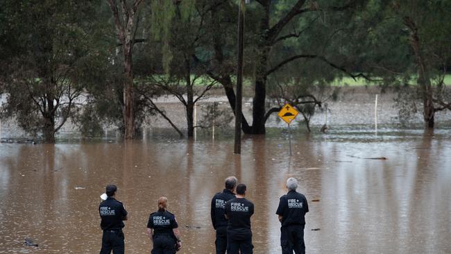 Flooding on the streets of Lismore on Tuesday while residents wait to see if the levee breaks. Picture: NCA NewsWire / Danielle Smith