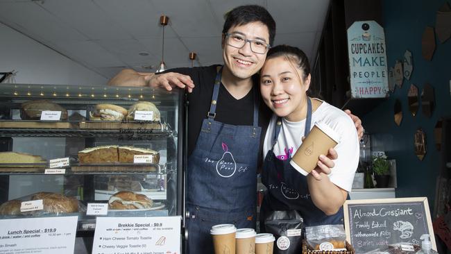 The Rare Pear is ready for 10 customers to be able to sit in the cafe at a time on Saturday as part of the lifting of strict COVID-19 restrictions. Frank Lau and his wife Annie Lau. Picture: Renae Droop