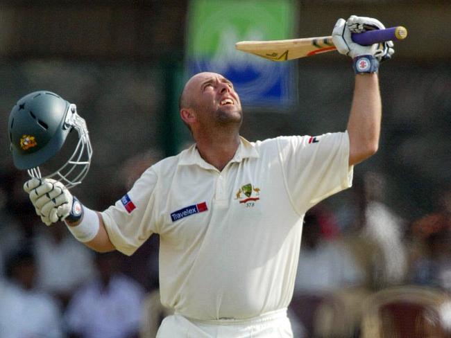 Darren Lehmann looks skywards as he thanks his late mentor David Hookes following a century in Sri Lanka. Picture: Phil Hillyard