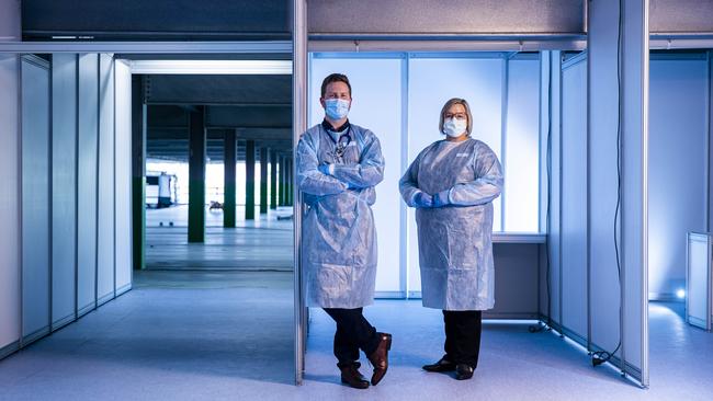 Sunshine hospital unit managers Donald Johnson and Kylie Roper in the COVID-19 vaccine hub being constructed in the carpark at Sunshine Hospital. Picture: Aaron Francis