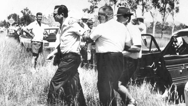 News 1970 — A distraught Bill Mackay at the site near Townsville where the bodies of his daughters Judith, 7, and Susan, 5, were found in August 1970. Source: The Courier-Mail Photo Archive