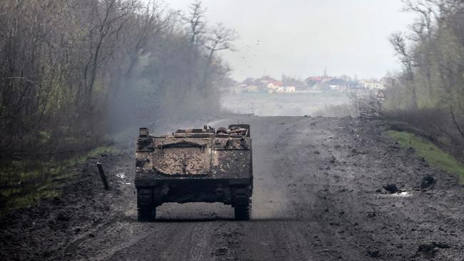 A Ukrainian soldier rides in an infantry fighting vehicle near the town of Bakhmut. Picture: AFP