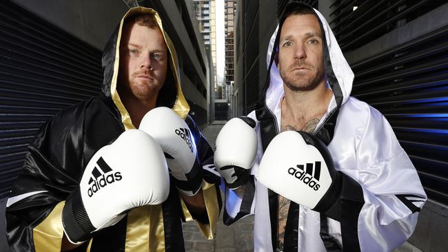 Cooney v Swanny: The Brownlow medallists will do battle in the boxing ring. Picture: Alex Coppel